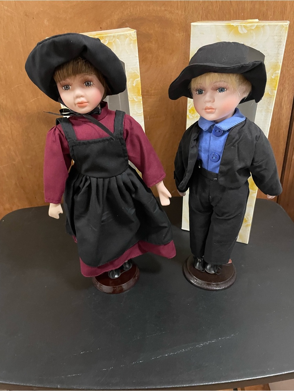 Porcelain Boy and Girl Dolls in Black, Blue and Burgundy Clothing
